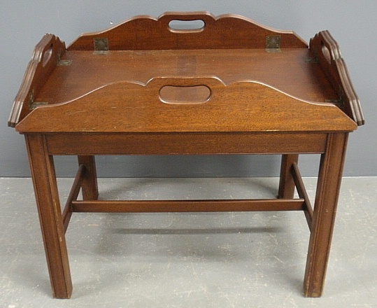 Appraisal: - Chippendale style mahogany butler s tray table with label