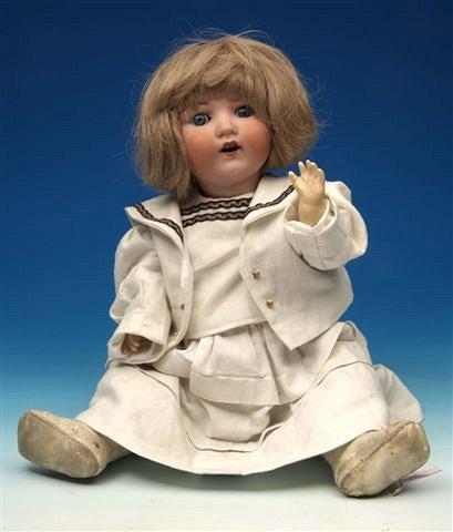 Appraisal: An Armand Marseille baby doll the bisque head with blue