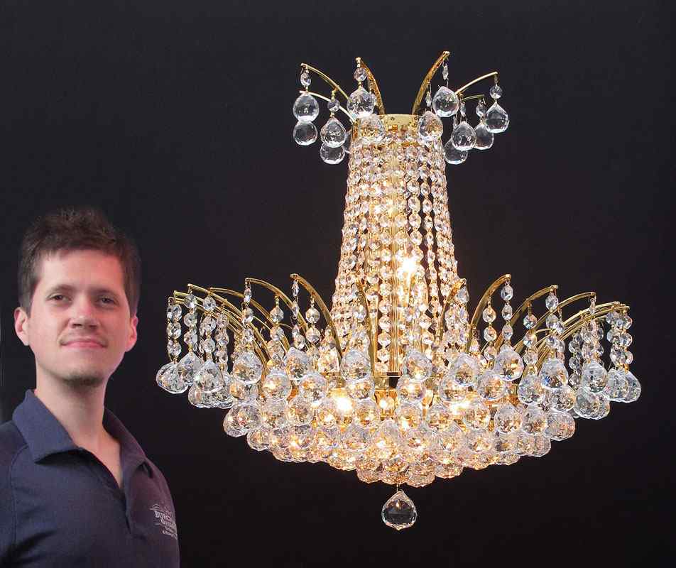 Appraisal: CRYSTAL LIGHT CHANDELIER The colors flash strong in this elegant