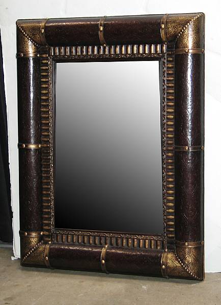 Appraisal: A pair of Portugese Baroque style embossed leather mirrors height