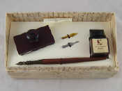 Appraisal: A boxed C'art dip pen writing set comprising pen nibs