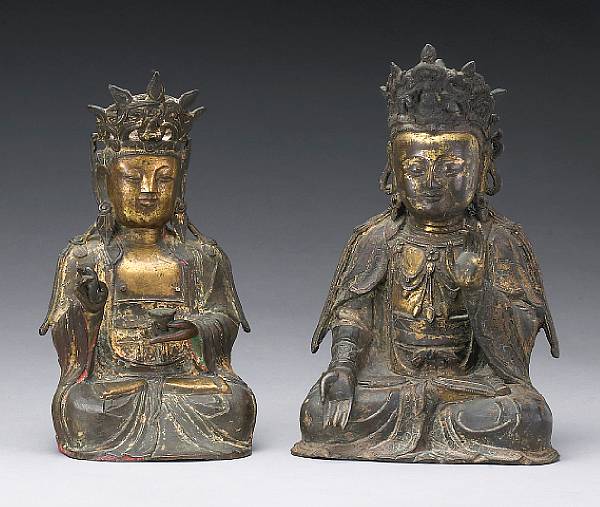 Appraisal: Two gilt bronze seated figures of Guanyin Ming Dynasty Each