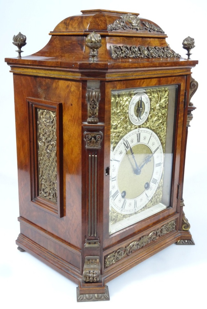 Appraisal: A late Victorian figured walnut bracket clock with gilt metal