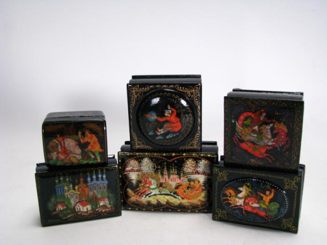 Appraisal: Six lacquered Russian boxes including one x two square two