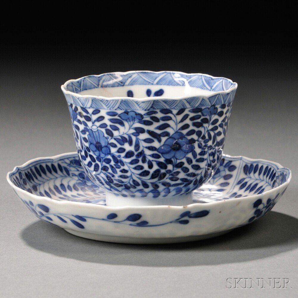 Appraisal: Blue and White Teacup and Saucer China th century the