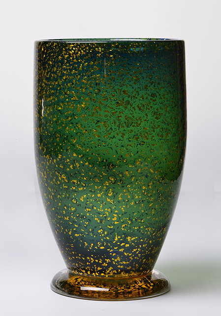 Appraisal: A GREEN GLASS VASE of inverted tapering form and standing