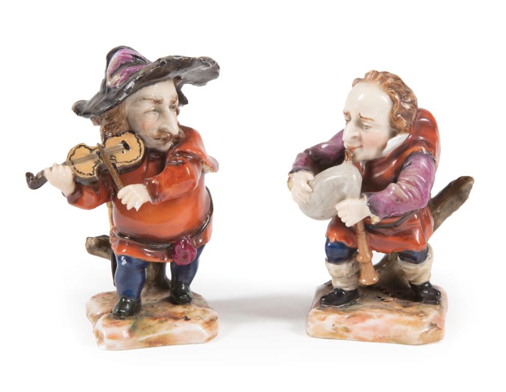 Appraisal: Two Polychrome Porcelain Figures of Dwarf Musicians th c probably