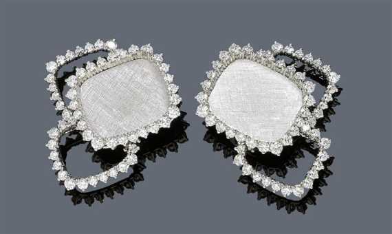 Appraisal: DIAMOND AND GOLD EAR CLIPS G BELIN White gold Fancy