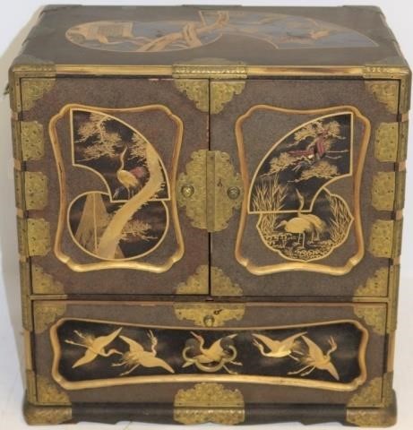 Appraisal: TH C JAPANESE EXPORT LACQUERWARE VALUABLESCABINET DECORATED WITH CRANES AND