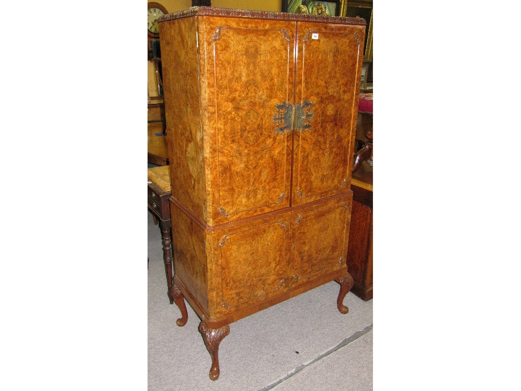 Appraisal: Burr walnut drinks cabinet on carved cabriole legs