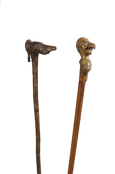 Appraisal: ANTI-SEMITIC FIGURAL CANES Lot of two includes a finely carved