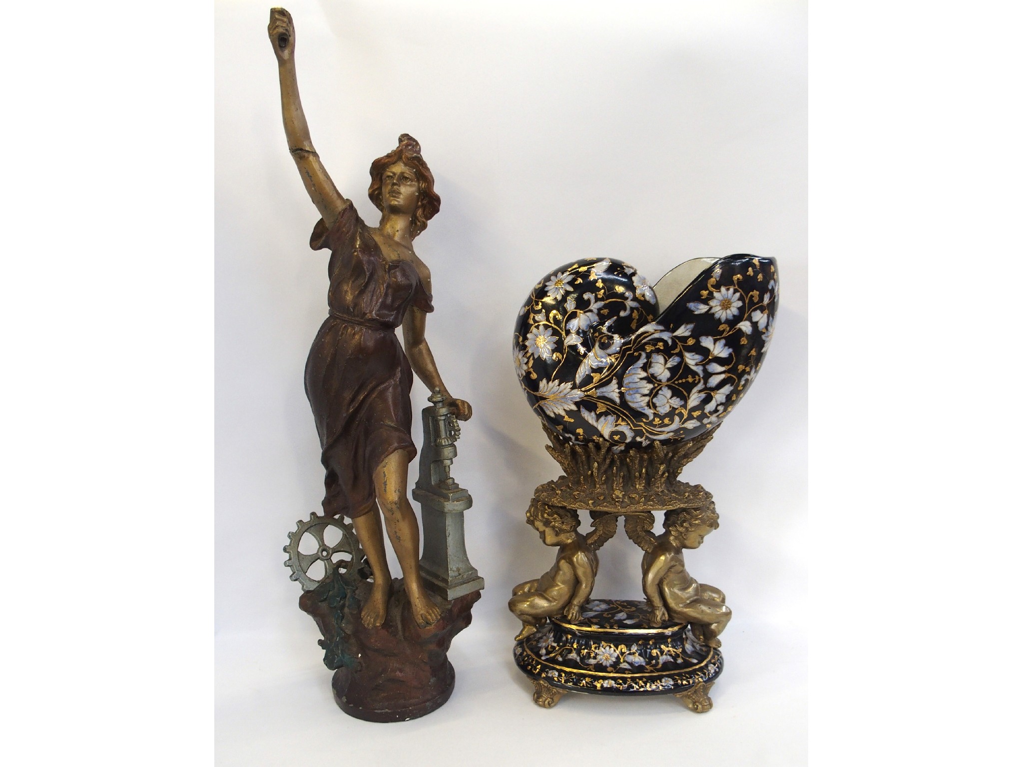 Appraisal: Pottery shell centre piece supported by gilt metal cherubs together