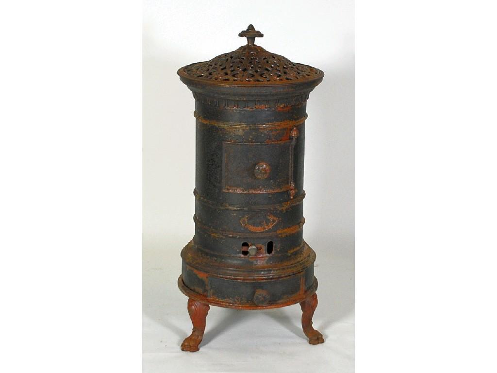 Appraisal: CONTINENTAL CAST IRON STOVE cylindrical with pierced cover cm high