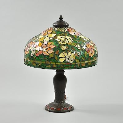 Appraisal: A Leaded Glass Peonie Lamp Shade with Art Nouveau Base