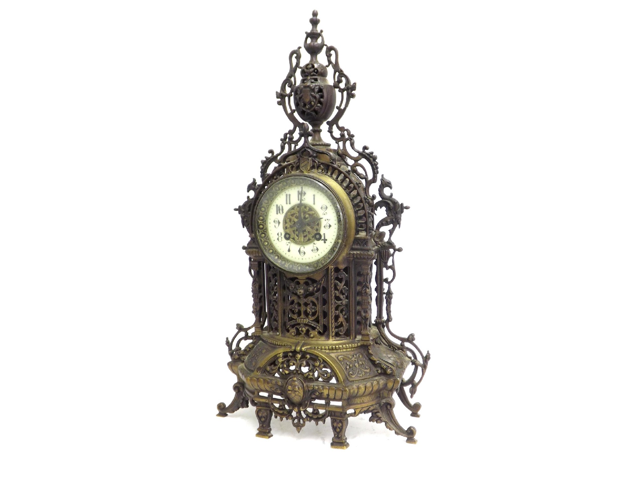 Appraisal: French brass cathedral style two train mantel clock the Japy