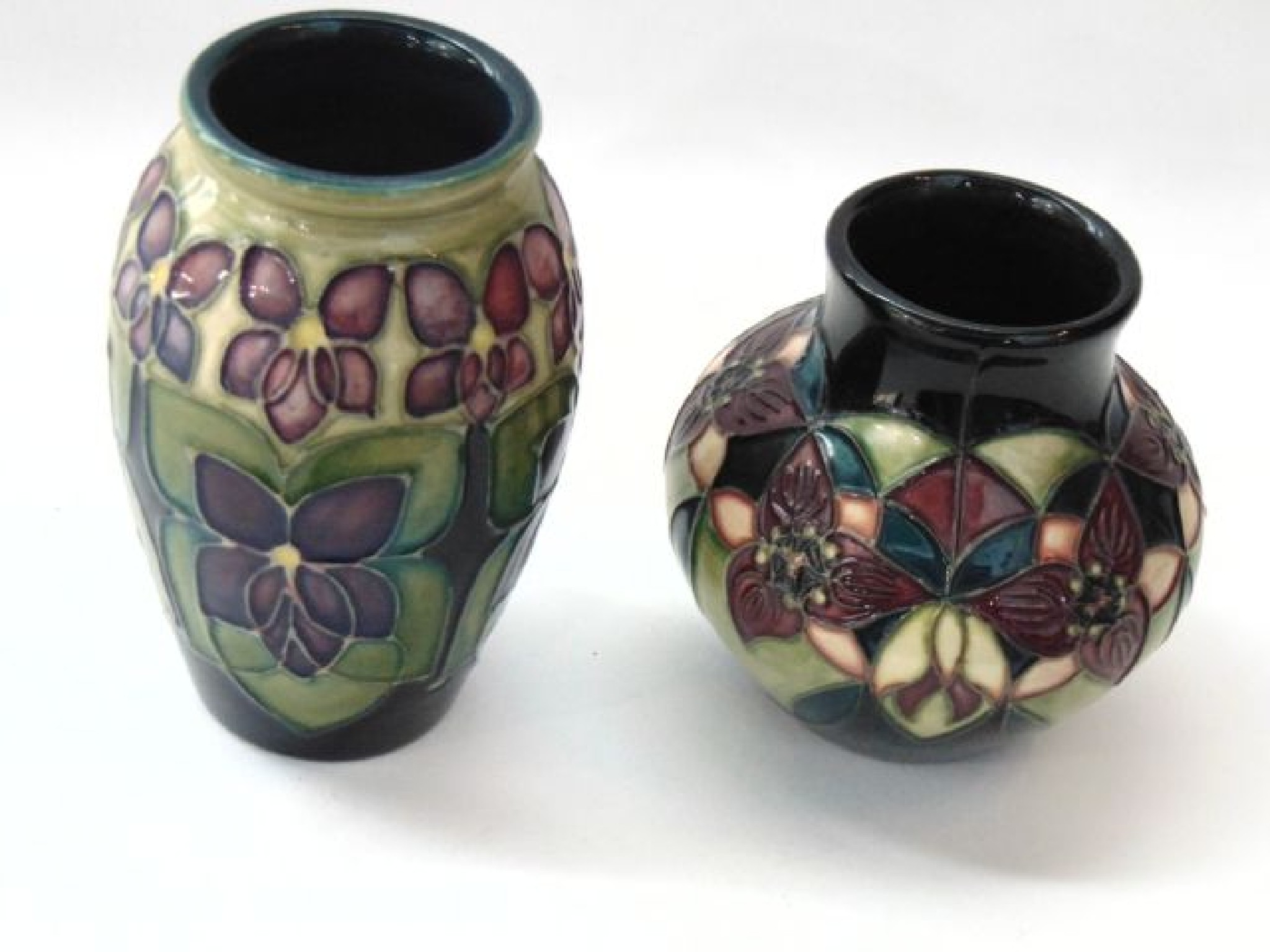 Appraisal: A Moorcroft vase of ovoid form with violet flower and