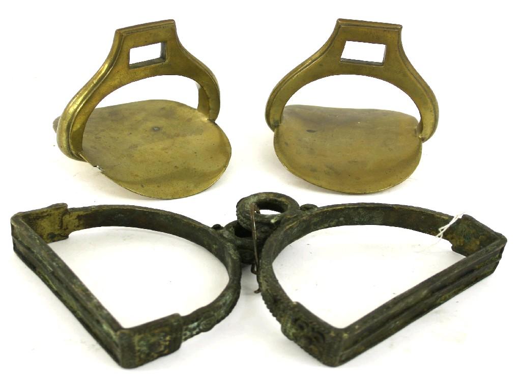 Appraisal: Pair of antique cast bronze horse riding stirrups of arched