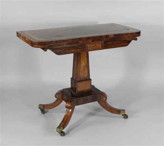 Appraisal: A Regency brass inlaid rosewood and amboyna card table on