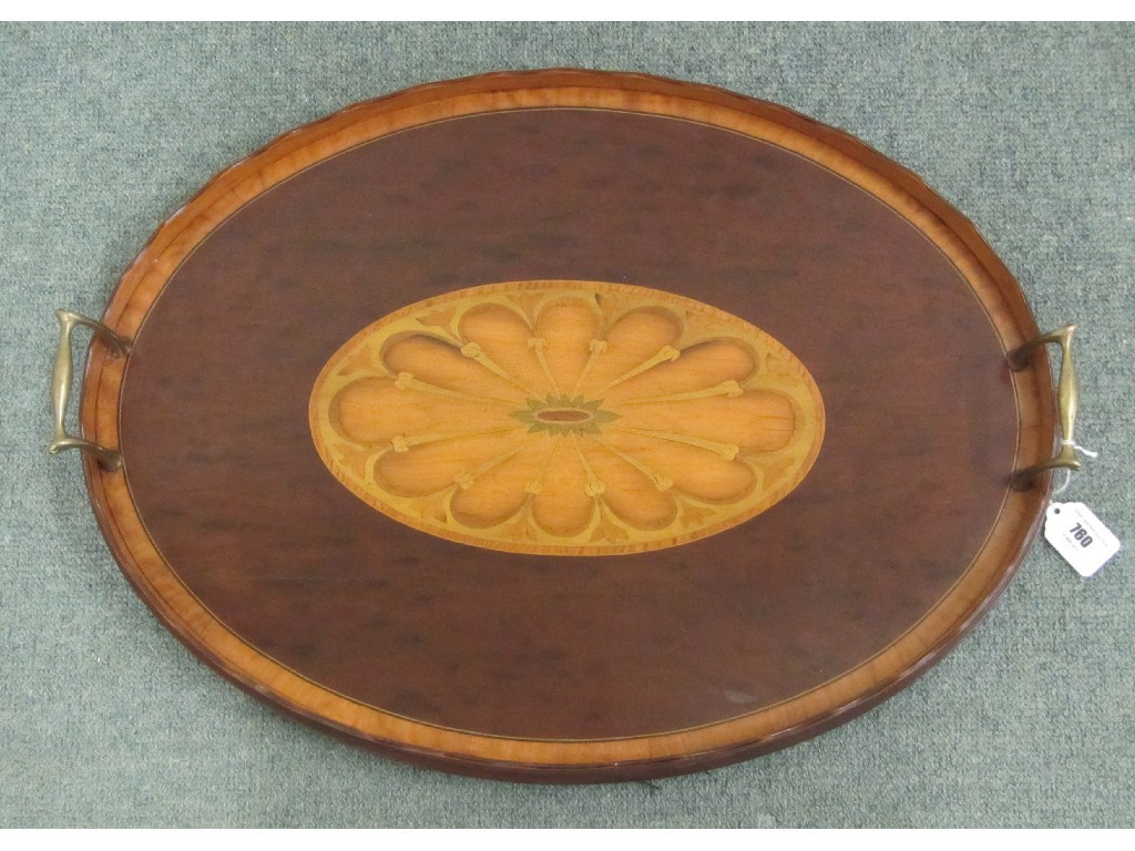 Appraisal: An Edwardian mahogany inlaid oval serving tray decorated with satinwood