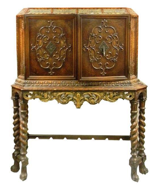 Appraisal: Early th C Jacobean style two-piece cabinet raised on high