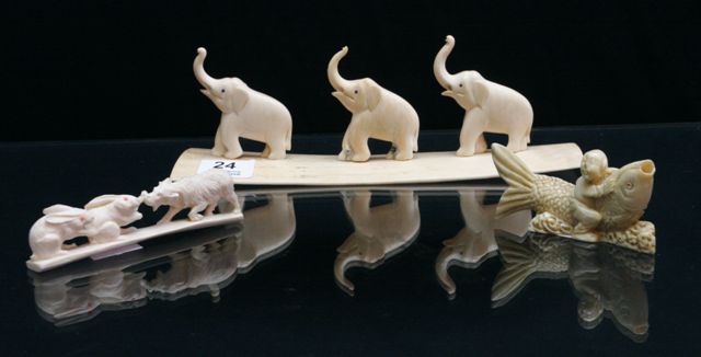 Appraisal: Eleven oriental carvings of animals in ivory bone and resin