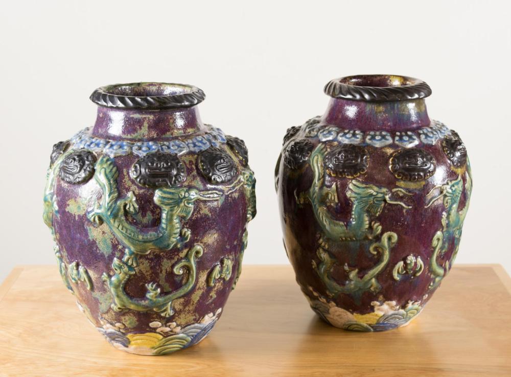 Appraisal: PAIR OF CHINESE POTTERY VASES with high shoulders and tapered