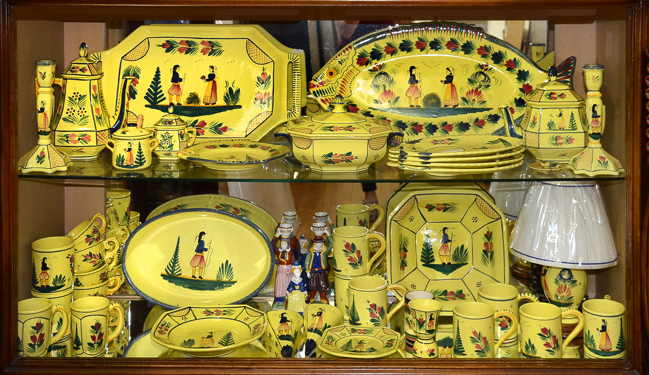 Appraisal: LARGE LOT OF QUIMPER CHINA SERVING PIECES Varied lot of