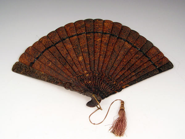 Appraisal: CHINESE EXPORT TORTOISESHELL FAN Carved in scenes and figures ''