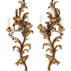 Appraisal: A Pair of Italian Baroque Style Carved Giltwood Three-Light Large