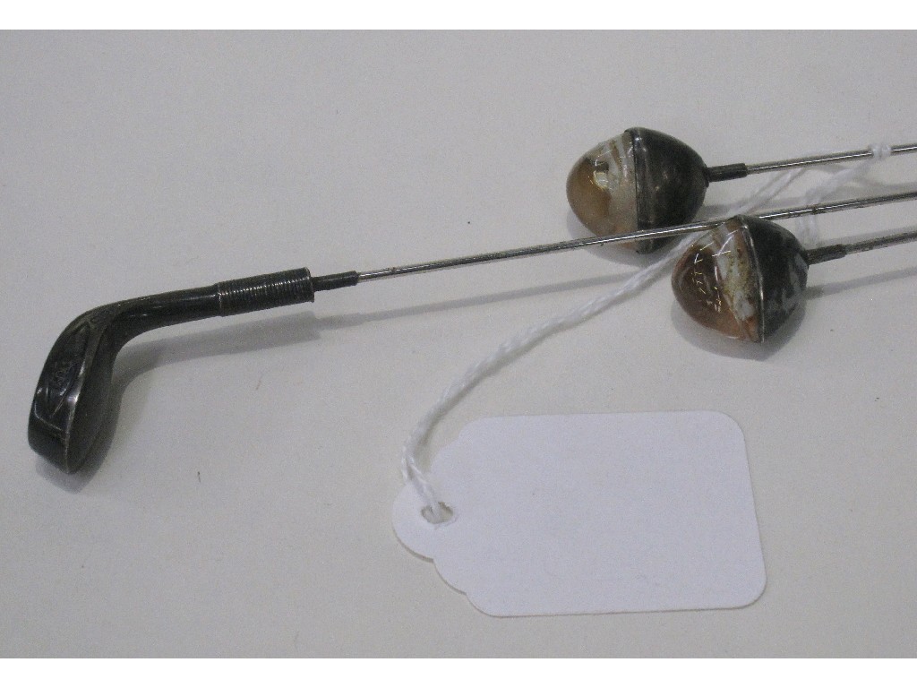 Appraisal: Lot comprising silver hatpin modelled as a golf club and