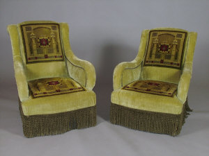 Appraisal: A pair of Edwardian armchairs upholstered in green with embroidered