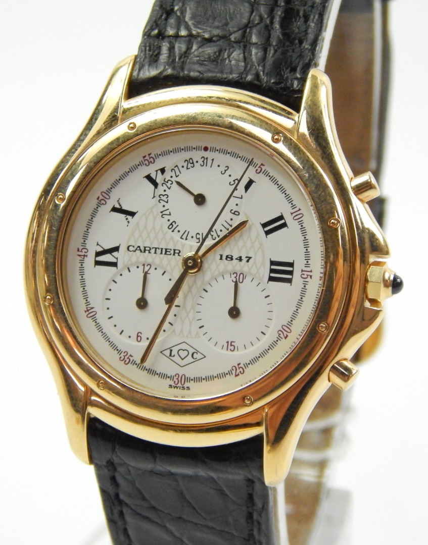 Appraisal: A Cartier Cougar ct gold chronograph wristwatch with white dial