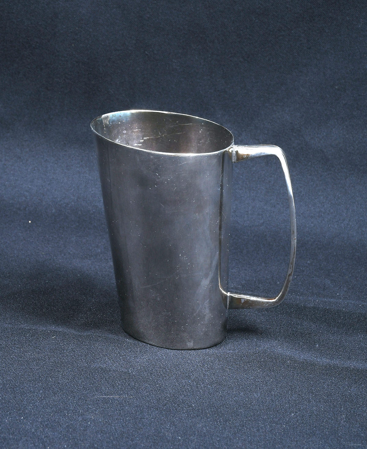 Appraisal: STERLING SILVER DANISH HANDLED CUP Mid-century modern Danish style Sterling