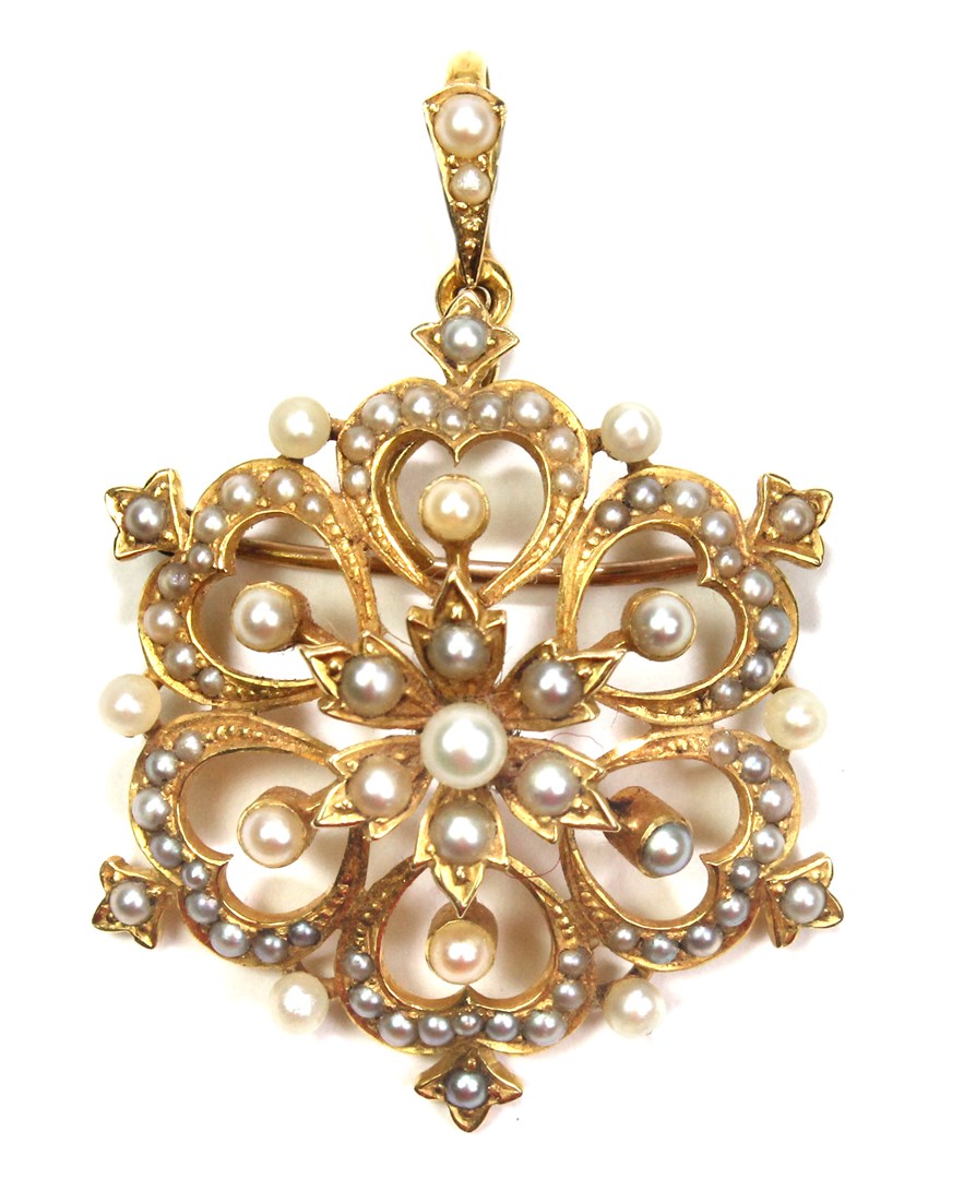 Appraisal: A late Victorian gold and half pearl set pendant brooch