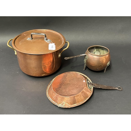 Appraisal: Three copper pieces lidded saucepan antique fry pan and footed