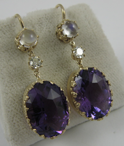 Appraisal: PAIR OF AMETHYST AND K GOLD EARRINGS each set with