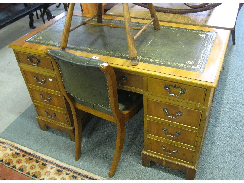 Appraisal: Lot comprising twin pedestal writing desk and a buttonback chair