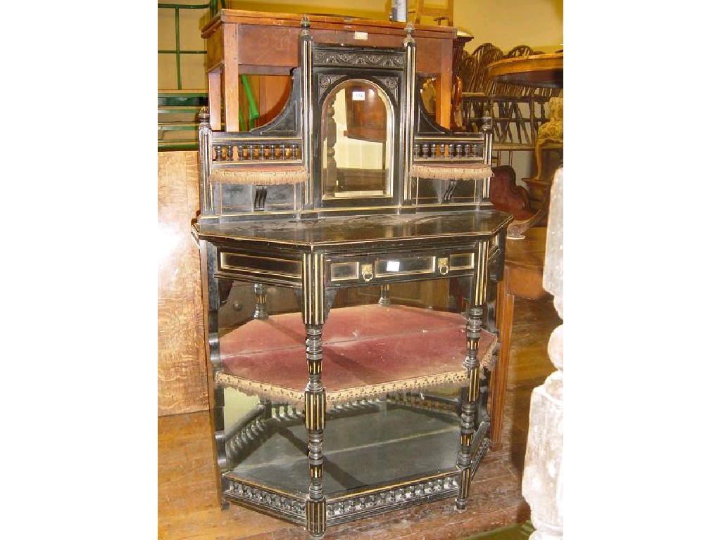 Appraisal: A small late Victorian aesthetic movement period ebonised chiffonier the