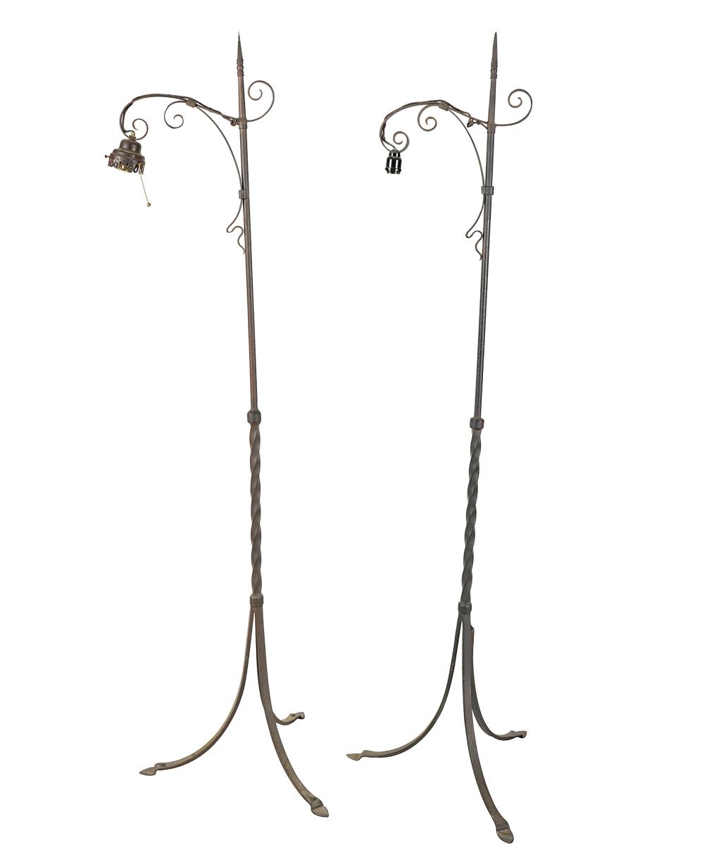 Appraisal: PAIR OF WROUGHT IRON FLOOR LAMPSeach with a single socket