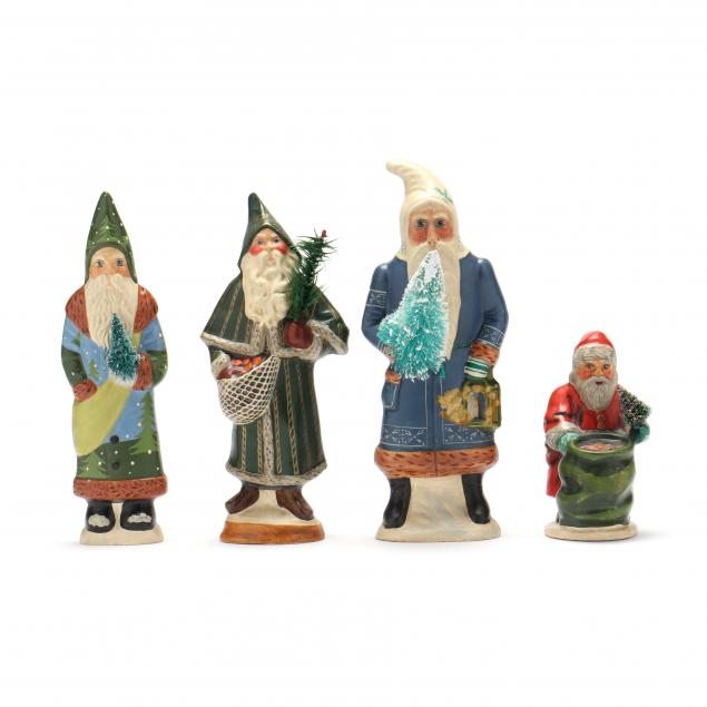 Appraisal: FOUR VAILLANCOURT SANTA FIGURES EACH WITH BRUSH TREE with green