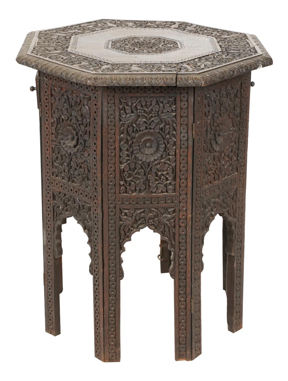 Appraisal: SYRIAN CARVED WOOD SIDE TABLEoctagonal the base hinged inches diameter