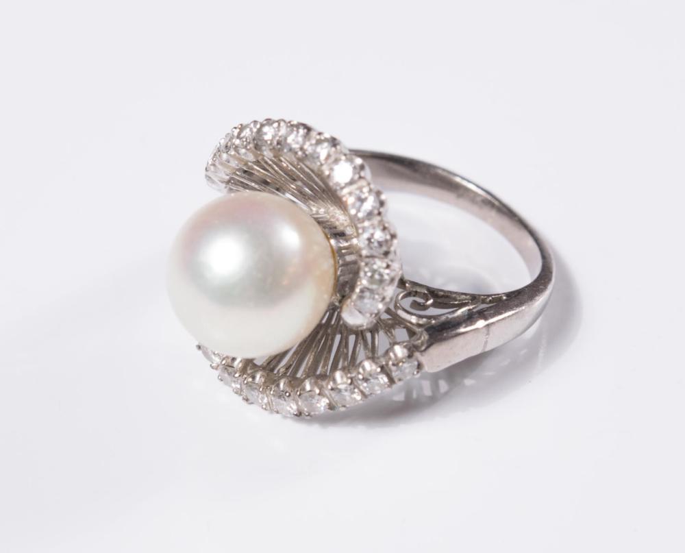 Appraisal: AKOYA PEARL DIAMOND AND FOURTEEN KARAT GOLD RING The white