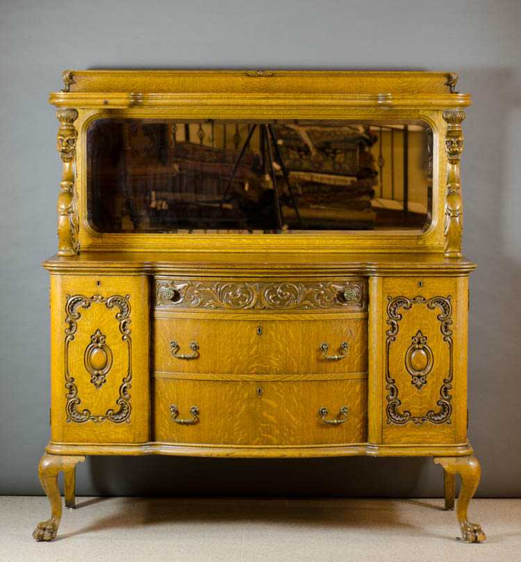 Appraisal: LATE VICTORIAN CARVED OAK SIDEBOARD attributed to the R J