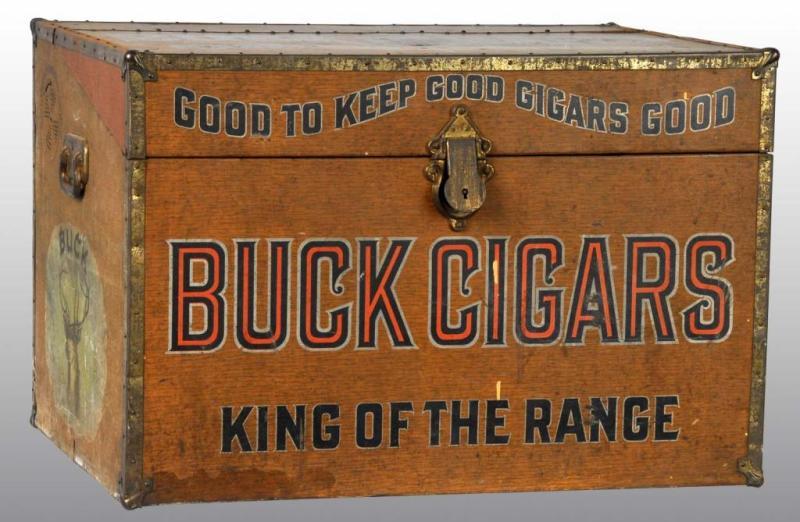 Appraisal: Large Tin Buck Cigars Trunk Description With humidifier Buck painted