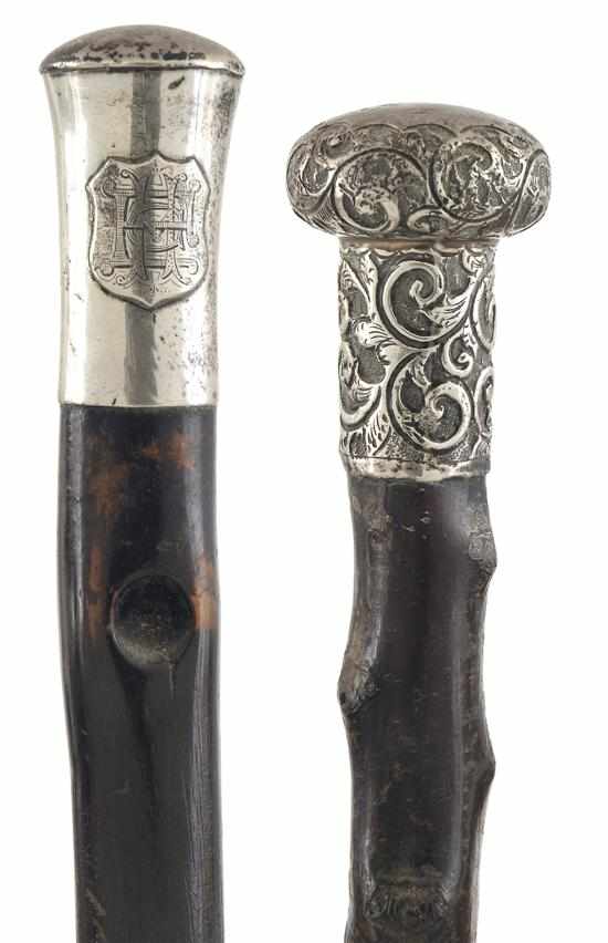 Appraisal: A GROUP OF TWO STERLING SILVER MOUNTED WALKING STICKS One