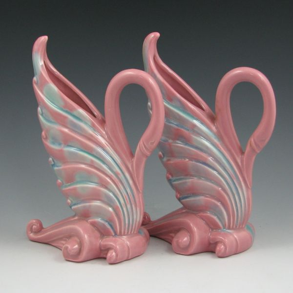 Appraisal: Pair of Royal Haeger swan vases in pink and turquoise