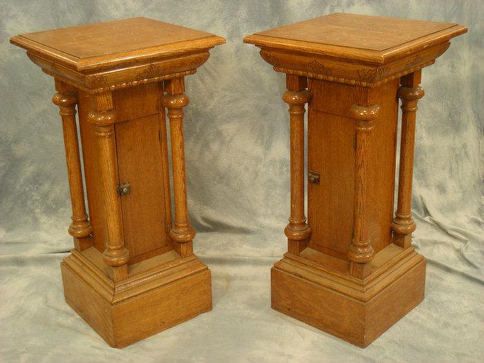 Appraisal: Pair of quarter sawn oak pedestals each with a leaf