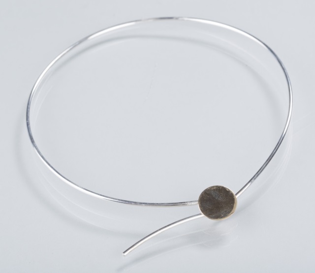 Appraisal: Betty Cooke Sterling Neck Ring with K Gold Disc K