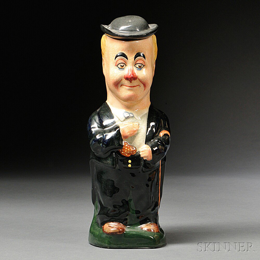 Appraisal: Royal Doulton George Robey Toby Jug and Cover England c