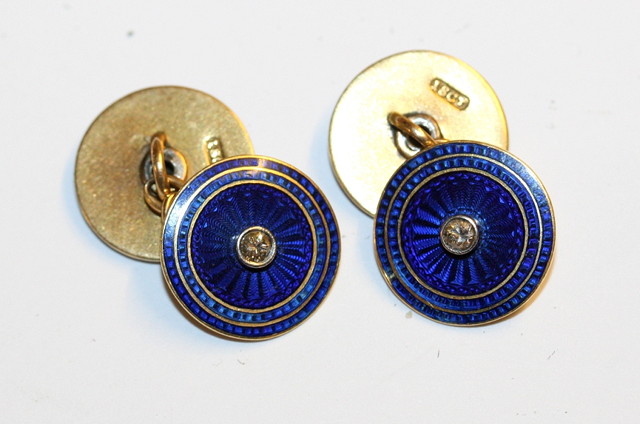 Appraisal: A PAIR OF CT GOLD AND ENAMELLED CUFFLINKS chain linked